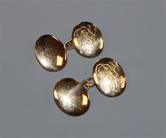 A pair of 18ct gold oval convex disc cufflinks, Birmingham 1922, 13.1 grams.